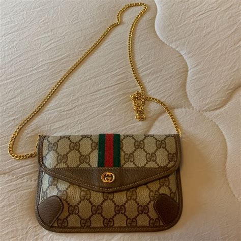 gucci mini clutch|More.